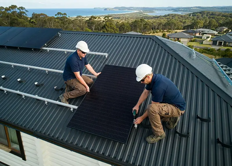 Installing solar panels on a roof